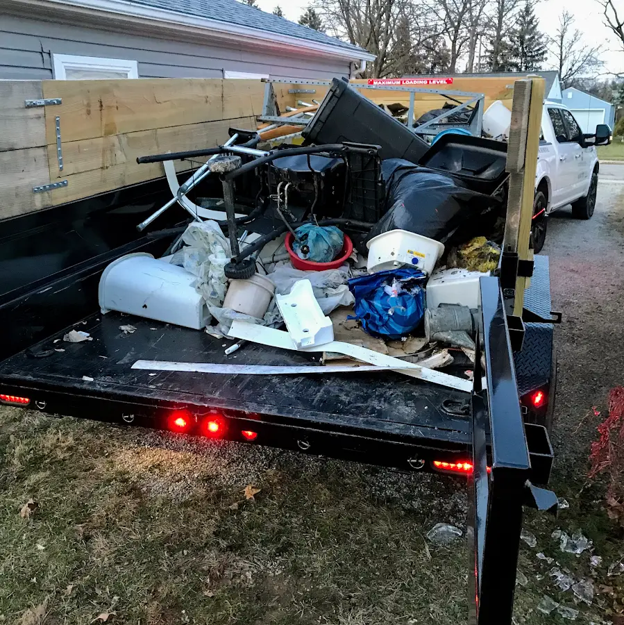 Roll-off dumpster delivered to a residential driveway in Bern